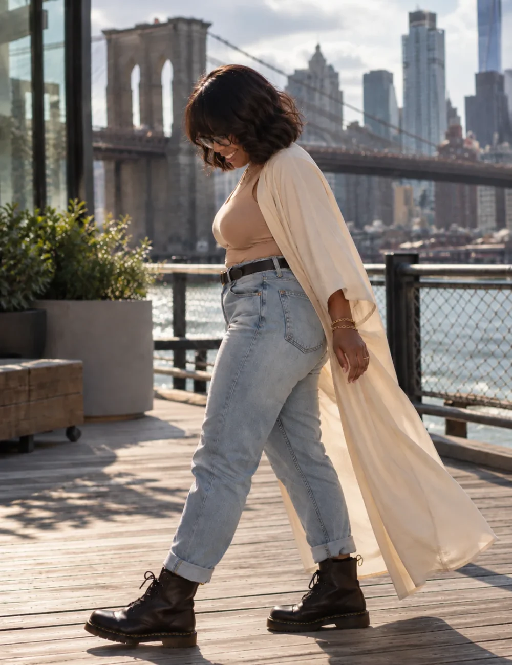 Alicia Ray, growth marketing strategist, walking near the Brooklyn Bridge